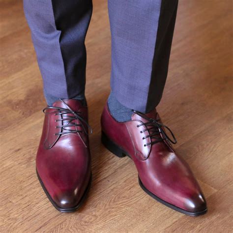 blue suit with burgundy shoes